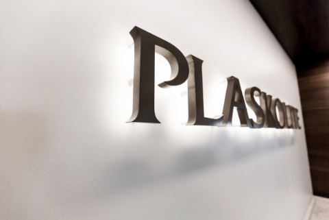 Plaskolite sign