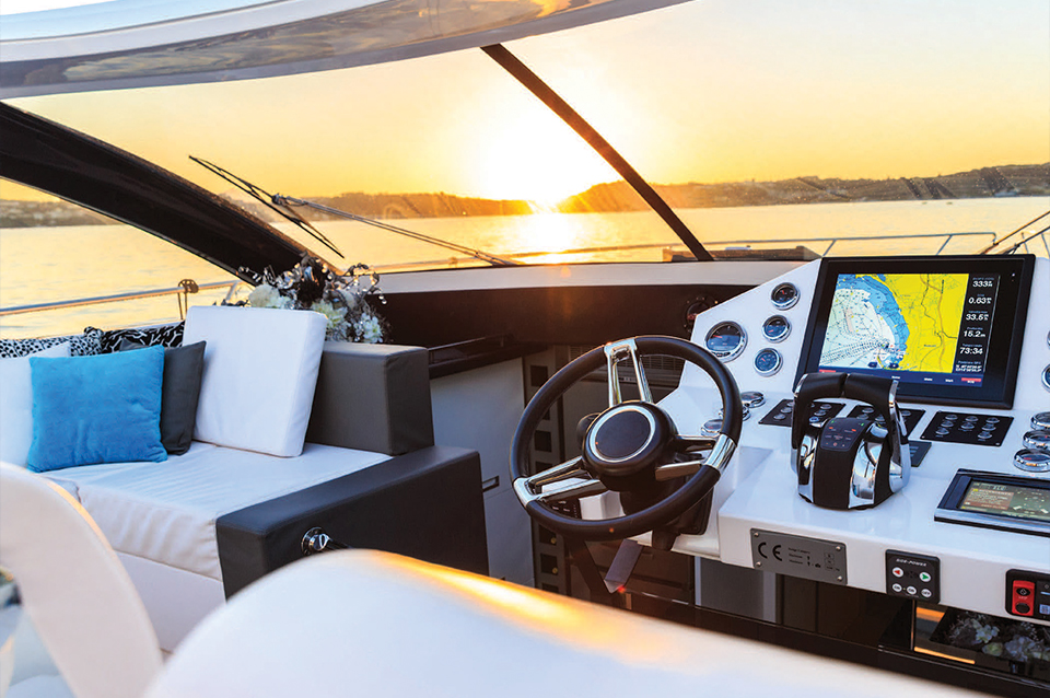 VERSEK ABS Material in a boat against a sunset backdrop on the water, showing the application of marine grade plastics